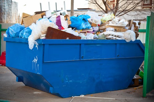 Sorting staff at a local transfer station handling recyclables